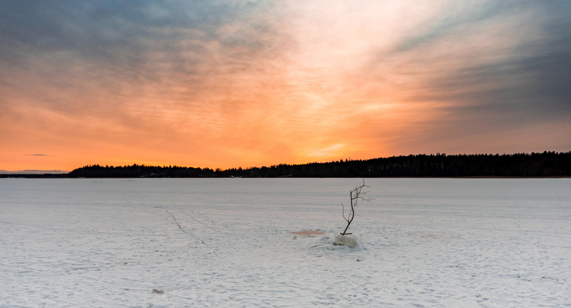 Sunset on a frozen lake